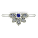 Top view of Astraea Liberty ring featuring a round blue sapphire centre surrounded by marquise diamonds in 18ct white gold or platinum