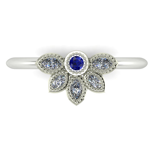 Top view of Astraea Liberty ring featuring a round blue sapphire centre surrounded by marquise diamonds in 18ct white gold or platinum