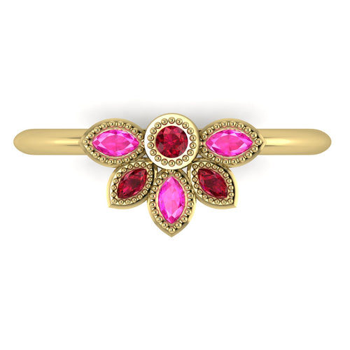 Top view of Astraea Liberty ring featuring a round red ruby centre surrounded by marquise pink sapphires and rubies in 18ct yellow gold.
