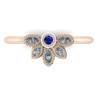 Top view of Astraea Liberty 18ct rose gold ring featuring a central blue sapphire and five marquise diamonds in a playful cluster.