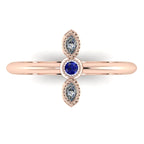 Top view of Astraea Trilogy 18ct rose gold ring featuring a central diamond and two round blue sapphires.