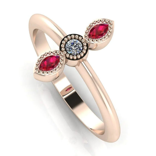 Angled perspective of an 18ct rose gold trilogy ring featuring a diamond and two rubies with fine milgrain texture.
