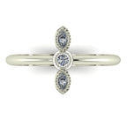 A top-down view of the Astraea trilogy ring, showing the symmetrical alignment and brilliance of the three round diamonds set in white gold.
