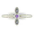 Top down view of an Astraea Trilogy ring featuring a central oval violet sapphire and two round brilliant diamonds in 18ct white gold.