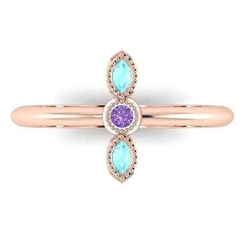 Top view of Astraea Trilogy 18ct rose gold ring featuring a central violet sapphire and two marquise aquamarines.