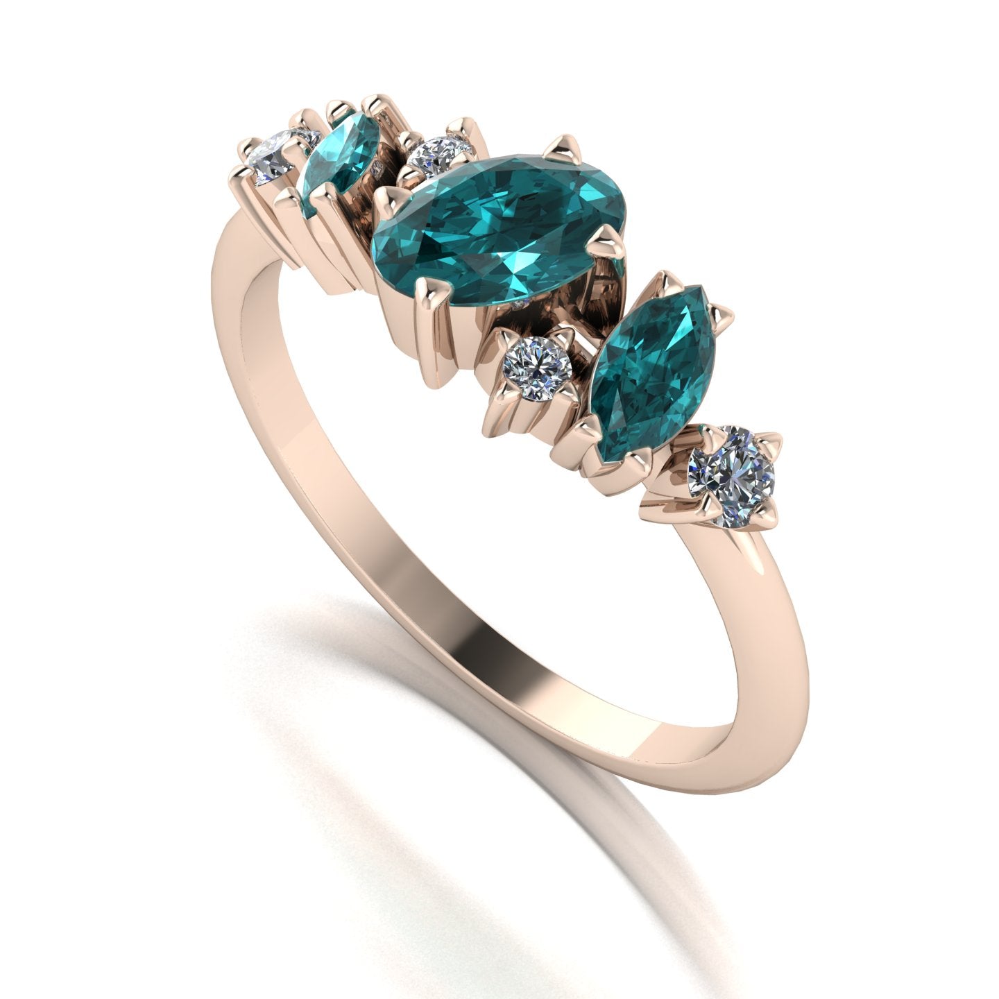 An angled view of the Atlantis Paradise ring highlighting the three-dimensional layout of the teal sapphire and diamond cluster.