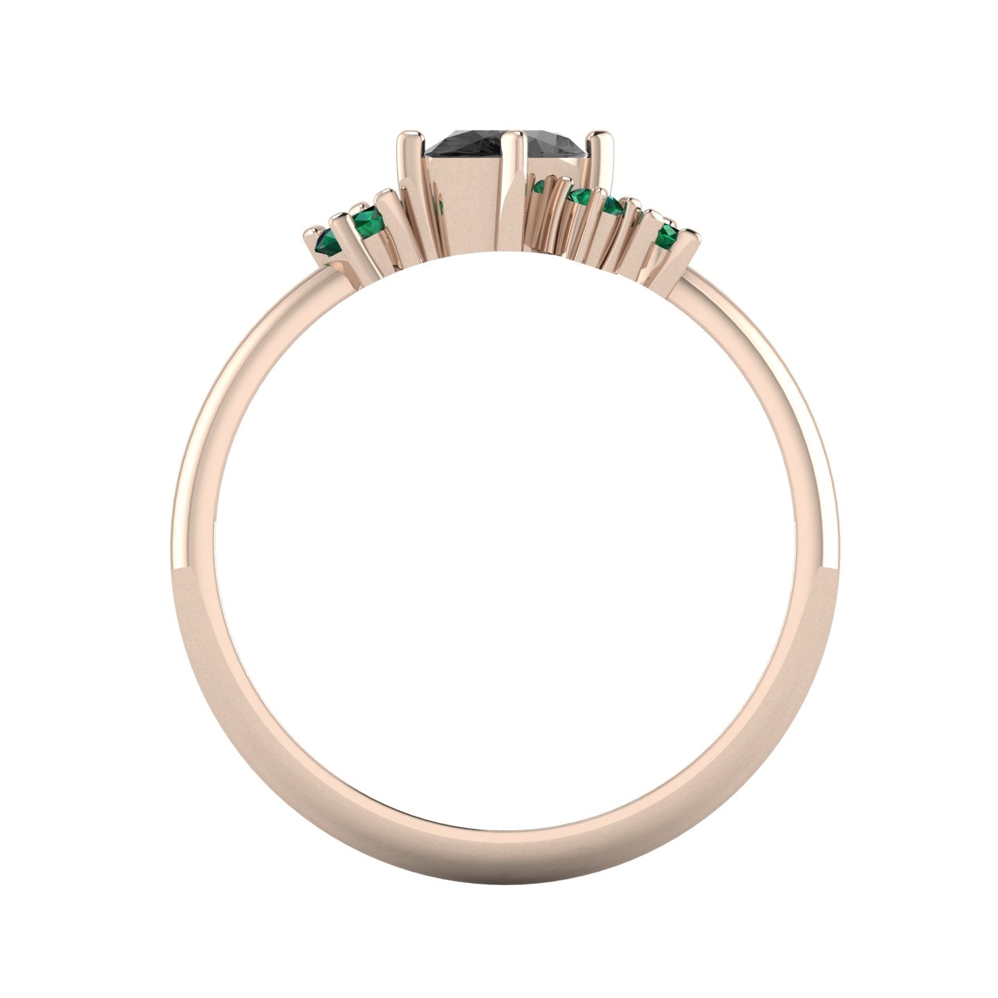 A view through the 18ct rose gold band, detailing the thickness of the ring and the precise, architectural arrangement of the asymmetrical black diamond and emerald settings.