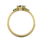 A view looking through the 18ct yellow gold band, detailing the solid thickness of the ring and the architectural arrangement of the hand-set gemstone cluster.