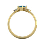 A view looking through the inside of the 18ct yellow gold band, showing the hallmark and the intricate construction of the asymmetrical stone mountings.