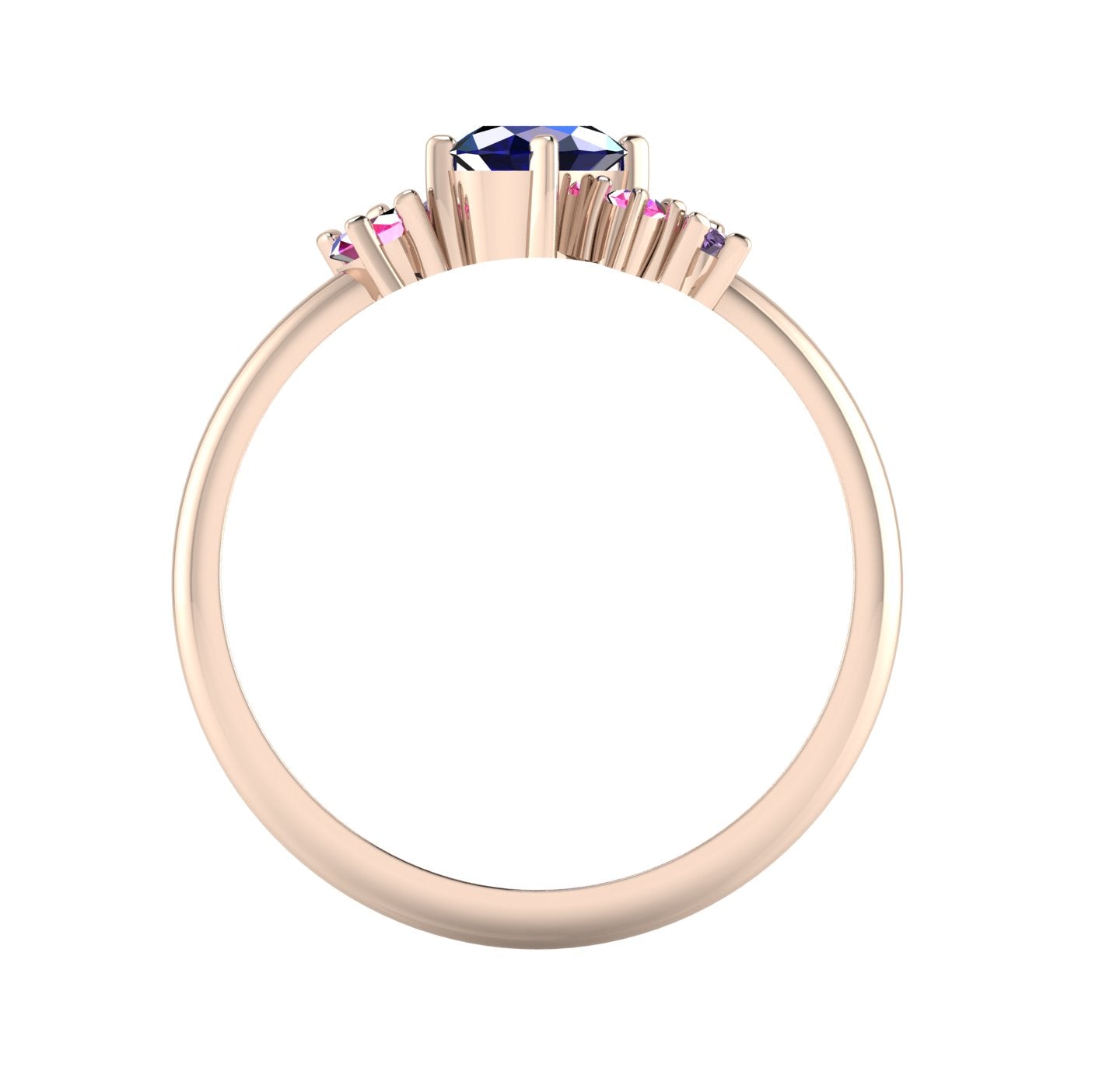 A view through the 18ct rose gold band, detailing the intricate under-gallery and the secure mounting of the blue rainbow sapphire stones.