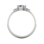 A view looking through the band, showcasing the intricate craftsmanship of the under-gallery and the secure mounting of the blue sapphires and diamonds.