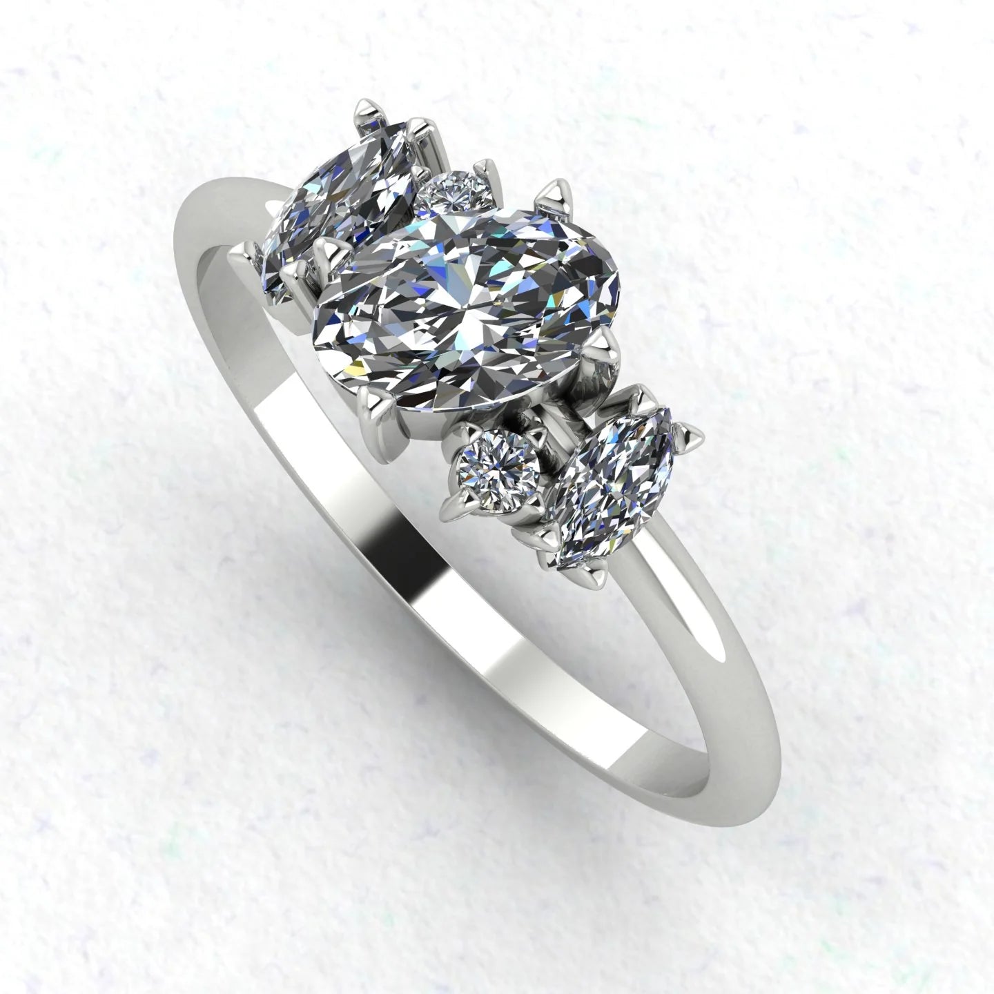 Atlantis diamond asymmetrical engagement ring in platinum or 18ct white gold, angled view showing the sculptural diamond cluster and asymmetric band, handmade in our London studio