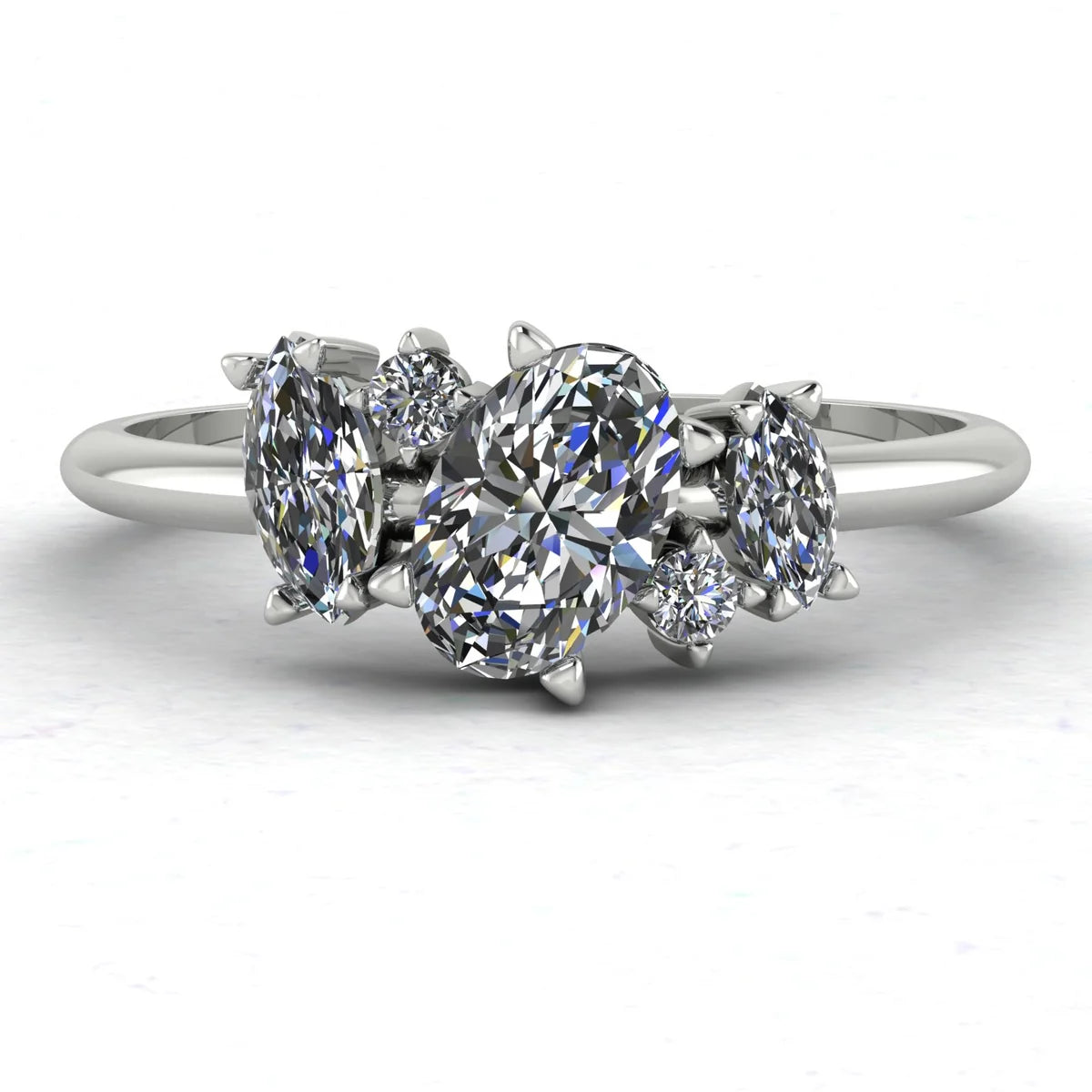 Atlantis diamond asymmetrical engagement ring in platinum or 18ct white gold, front view showing the organic diamond cluster and sculptural asymmetric setting, handmade in our London studio