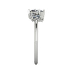 Atlantis diamond asymmetrical engagement ring in platinum or 18ct white gold, side profile showing the low-set diamond cluster and elegant band, handmade in London