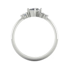 Atlantis diamond asymmetrical engagement ring in platinum or 18ct white gold, through-finger view showing the open gallery and diamond cluster setting, handmade in our London studio