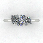 Atlantis diamond asymmetrical engagement ring top view in platinum or 18ct white gold, showing the sculptural diamond cluster and asymmetric design, handmade in our London studio
