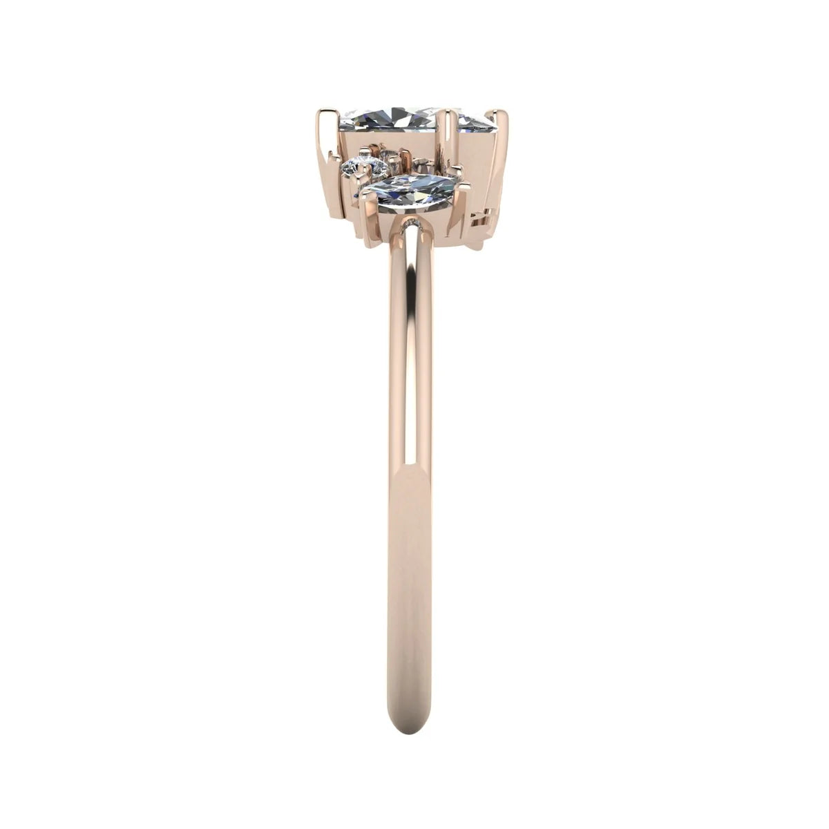 Side profile of Atlantis asymmetrical diamond engagement ring in 18ct rose gold showing varying stone heights and slim band