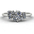 Front view of the Atlantis engagement ring, featuring a contemporary asymmetrical cluster of sparkling lab grown diamonds in a white metal setting.