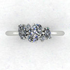 Top view of the Atlantis engagement ring, featuring a contemporary asymmetrical cluster of sparkling lab grown diamonds in a white metal setting.