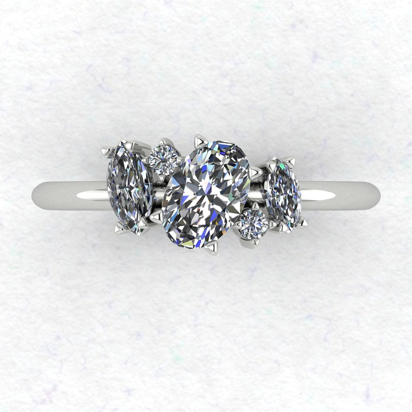 Top view of the Atlantis engagement ring, featuring a contemporary asymmetrical cluster of sparkling lab grown diamonds in a white metal setting.
