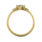 A view through the 18ct yellow gold band, highlighting the intricate under-gallery and the secure mounting of the asymmetrical diamond cluster.