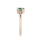 Side profile of the Atlantis engagement ring highlighting the cluster setting and polished rose gold band.