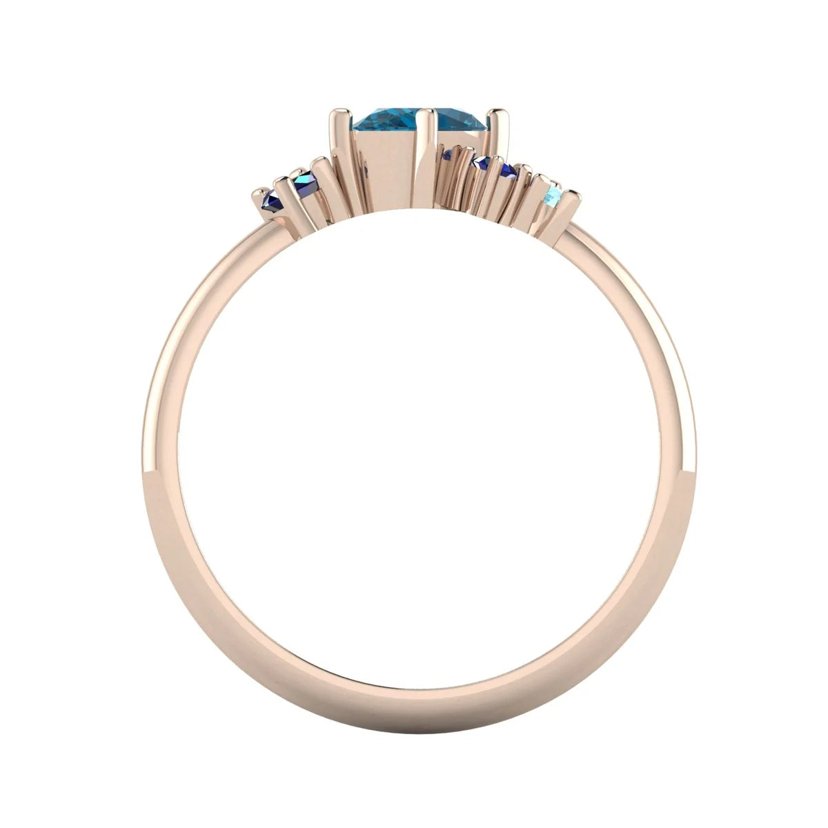 Atlantis London blue topaz and sapphire asymmetrical engagement ring in 18ct rose gold, through-finger view showing the hallmark and detailed asymmetric stone mountings, handmade in our London studio