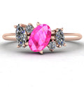 Front view of the Atlantis engagement ring, featuring a hand-clustered arrangement of pink sapphires and brilliant diamonds in a warm 18ct rose gold setting.