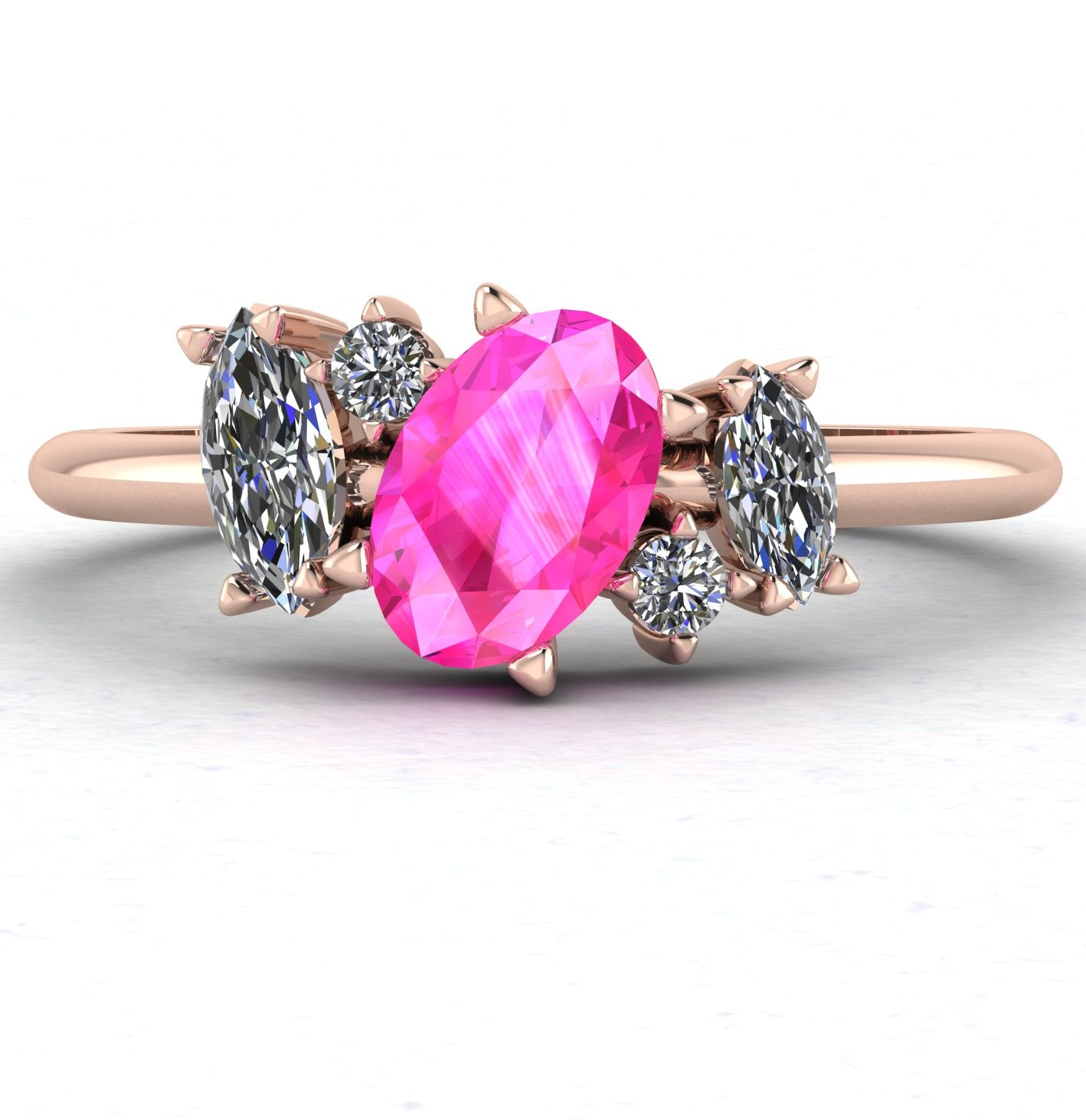 Front view of the Atlantis engagement ring, featuring a hand-clustered arrangement of pink sapphires and brilliant diamonds in a warm 18ct rose gold setting.