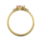 A view through the 18ct yellow gold band, detailing the intricate under-gallery and the secure mounting of the pink sapphire and diamond cluster.