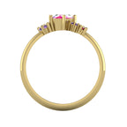 A side profile shot of the Atlantis ring detailing the unique organic settings and the varying heights of the pink, violet, and red gemstones.