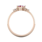 A view looking through the 18ct rose gold band, detailing the solid thickness of the ring and the architectural arrangement of the asymmetrical gemstone settings.