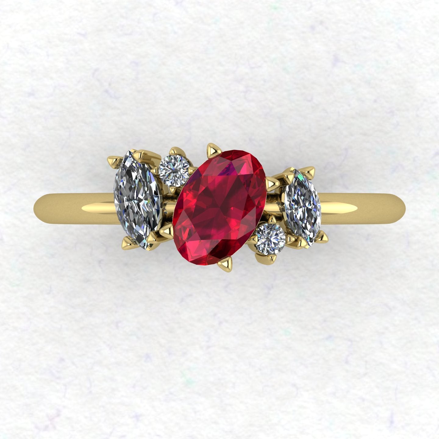 A top-down view of the Atlantis engagement ring, featuring an asymmetrical cluster of vibrant red rubies and sparkling diamonds set in 18ct yellow gold.