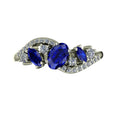 Top view of the Atlantis Storm 18ct white gold ring featuring a central blue sapphire and white diamond accents.