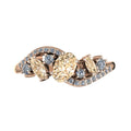 Top view of the Atlantis Storm ring showcasing the organic wave setting and the cluster of champagne diamonds in rose gold.