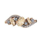 Top view of the Atlantis Storm ring showcasing the organic wave setting and the cluster of champagne diamonds in rose gold.