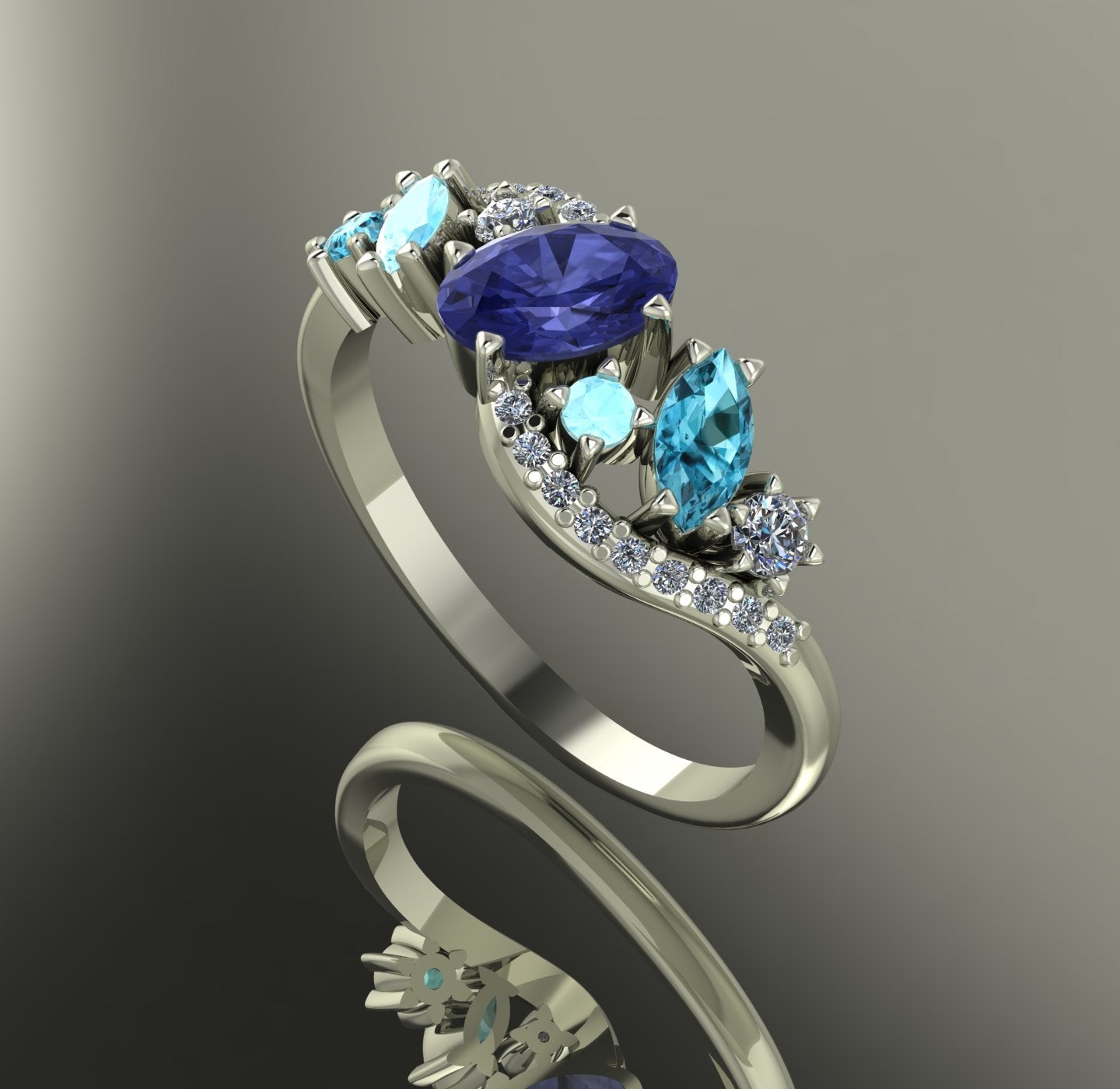 Side profile showing the intricate wave setting in white gold with tanzanite and aquamarine gemstone cluster.