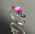 Detailed side profile showing the cluster of pink and violet gemstones in a wave-style white gold setting.