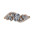 Top-down hero shot of the Atlantis Storm 18ct rose gold ring, featuring an organic cluster of brilliant white diamonds
