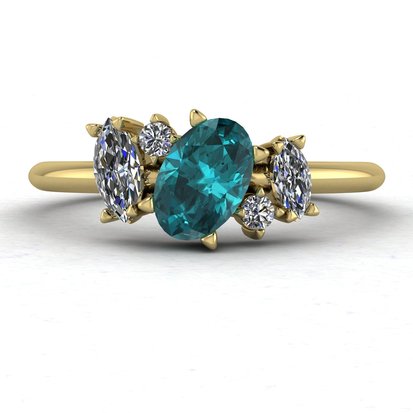 Front view of the Atlantis engagement ring, featuring an asymmetrical cluster of ocean-blue teal sapphires and sparkling diamonds in 18ct yellow gold.