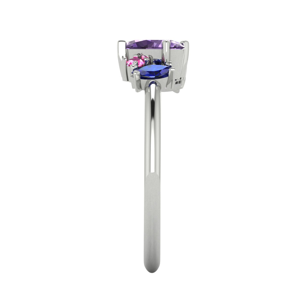 Atlantis violet, pink and blue sapphire asymmetrical engagement ring in 18ct white gold or platinum, side profile showing the unique cluster arrangement and sleek band, handmade in our London studio