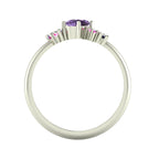 Atlantis violet, pink and blue sapphire asymmetrical engagement ring in platinum or white gold, through-finger view showing the intricate under-gallery and secure sapphire settings, handmade in London