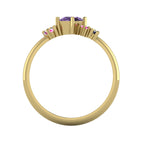 A view through the 18ct yellow gold band, highlighting the intricate under-gallery and the secure mounting of the violet, pink, and red gemstones.