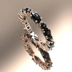 Black Diamond Allsorts eternity ring in 18ct rose gold featuring a row of brilliant-cut black diamonds.