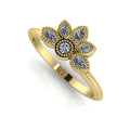 Perspective view of an all-diamond cluster ring in 18ct yellow gold with intricate milgrain beaded detailing.