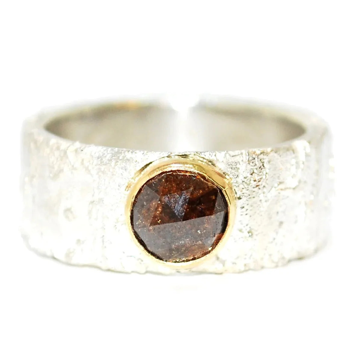 Rivda brown cognac diamond ring in sterling silver with 9ct gold setting on white background — front view