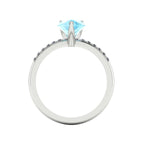 Through view of the Calista engagement ring, featuring a massive 1.9-carat pear-shaped aquamarine and brilliant white diamonds.