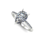 Front three-quarter studio view of the Calista lab diamond ring, highlighting the brilliant white diamonds pavé-set into the precious metal shoulders.