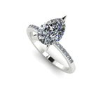 High angle studio detail shot of the Calista engagement ring, showing the flawless light reflection and facets of the 2ct pear-cut lab diamond.