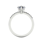 Through-finger view of the 18ct white gold lab diamond ring, showing the clean interior under-gallery and open structure beneath the stones.